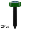 Two green and black solar-powered ultrasonic animal repellent devices.