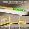 A gold and green wireless rechargeable picture light battery indicator and USB charging component.