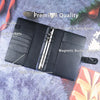 A black A5 ring binder for photocard albums featuring pen loops and card pockets.