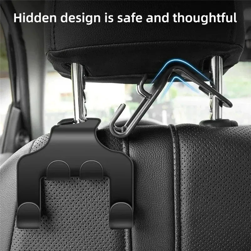 A close-up view of a black car back seat phone holder hook mechanism installed on the seat fabric.