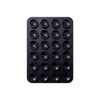 Black silicone suction pad with multiple circular holes for phone mounts