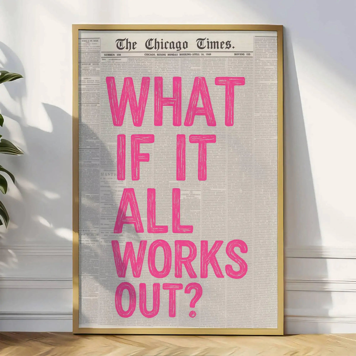 A framed print featuring a large pink text quote on a vintage newspaper background.