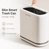 A white slim smart trash can is shown open, highlighting its narrow space design and one-touch opening feature.