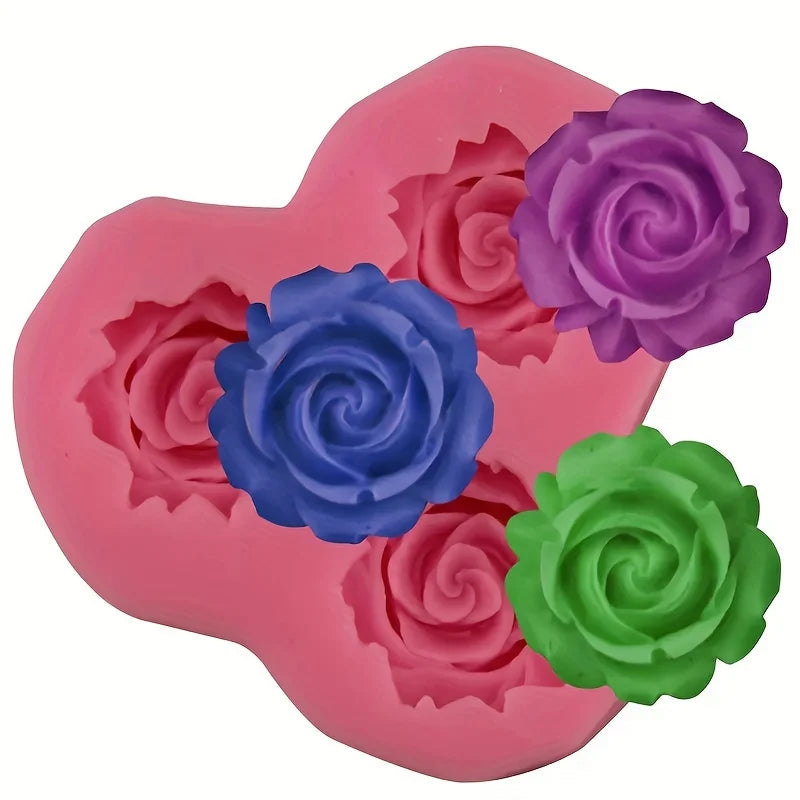 A pink silicone mold shaped like a heart with multiple sculpted rose designs in purple, blue, and green.