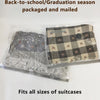 Two reusable vacuum compression bags packaged and mailed, designed to fit all sizes of suitcases.