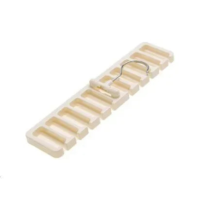 A beige multifunctional belt and tie organizer with a hanging rack for storage.