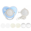 A sparkling rhinestone pacifier with a clip and a light blue heart-shaped silicone shield is shown next to several white sili