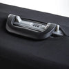 Close-up of a gray suitcase cover protector latch mechanism on a black luggage bag.