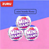 A display of Mini Brands mystery blind boxes featuring miniature furniture toys against a pink background.