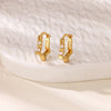 Boucles d'oreilles créoles en zircon cubique ton or