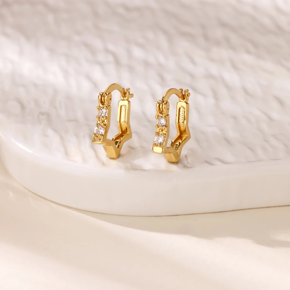 Boucles d'oreilles créoles en zircon cubique ton or