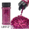 A glass jar of pink glitter and a pile of loose holographic chunky nail glitter mix.