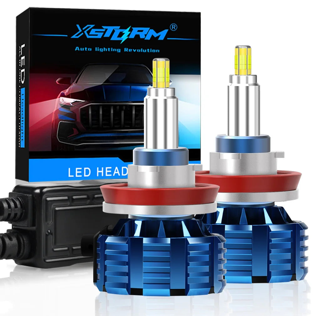 A set of XSTORM H7 LED headlight bulbs and a packaging box displayed on a reflective surface.