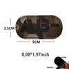 Tactical blood type patch with hook and loop backing featuring the letters AB