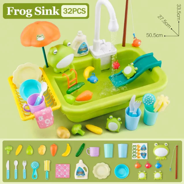 A green kids electric kitchen sink playset with running water, featuring various fruit and animal figures.