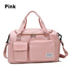 Pink waterproof travel duffle bag with a shoe compartment