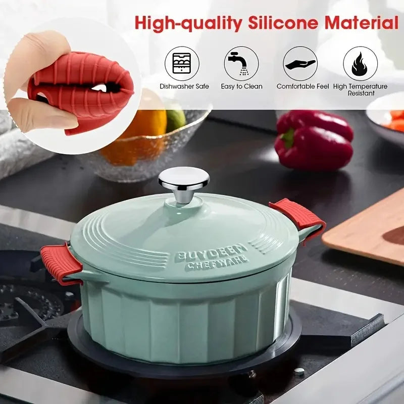 A teal silicone pan with a lid and handle covers is shown on a stovetop.