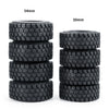 A set of black soft rubber tires for RC crawler cars, shown in stacked circular form.