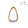 A set of two magnetic curtain tiebacks featuring a natural rope texture and silver metal clasp.
