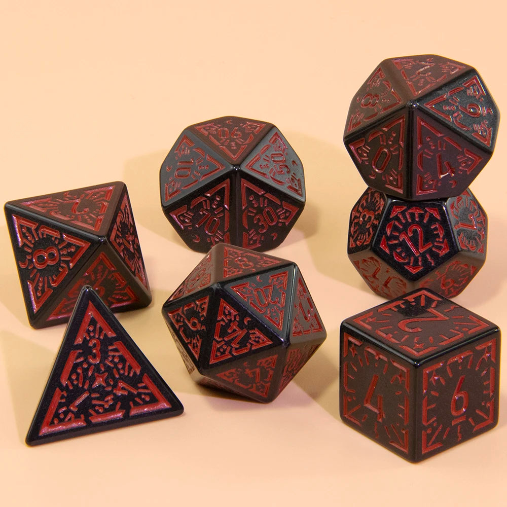 A set of multi-sided polyhedral dice in dark red and black colors displayed on a light background.