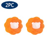 Two orange reusable laundry balls designed for pet hair and lint removal