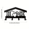 Black rustic iron wall hooks shaped like a house with a heart and the word HOME for organization