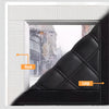 Close-up of a black thermal window film with a hook and loop for installation.