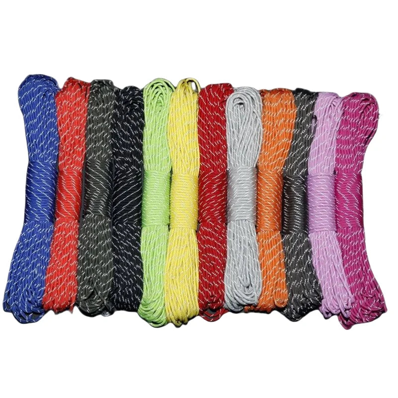 A collection of brightly colored paracord ropes in various shades including blue, red, green, yellow, and purple.