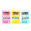 Three colorful interactive vending machine toys in pink, yellow, and blue with play coins and drinks.