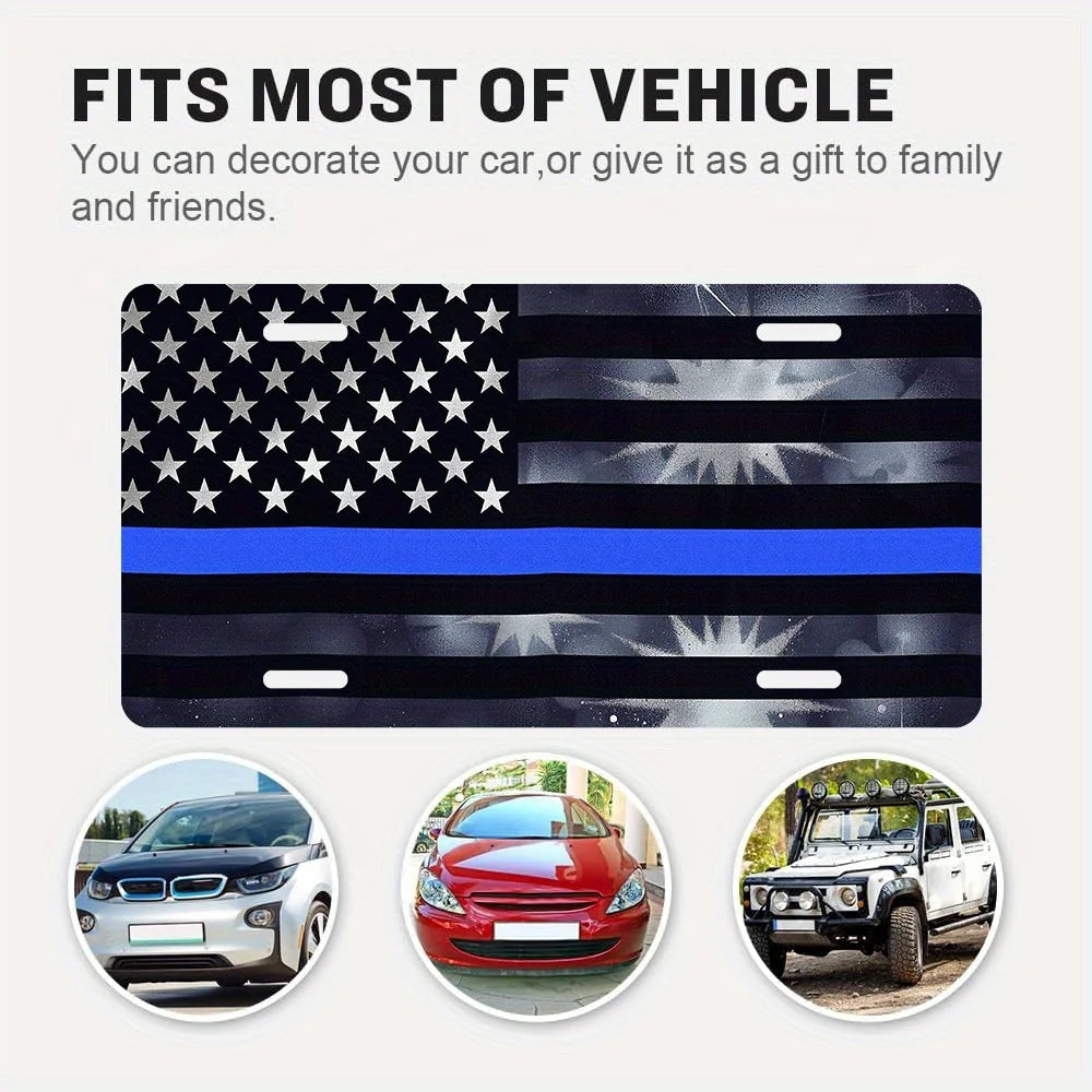 A black and white American flag design featuring stars and stripes on a metal sign.