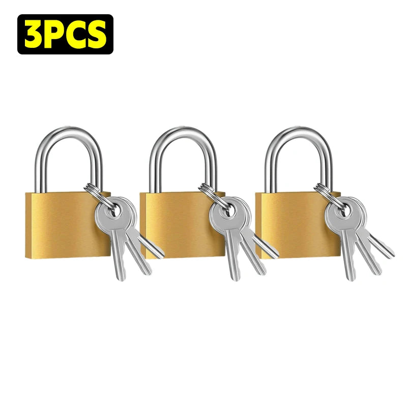 Three gold-colored mini padlocks with silver keys shown together.