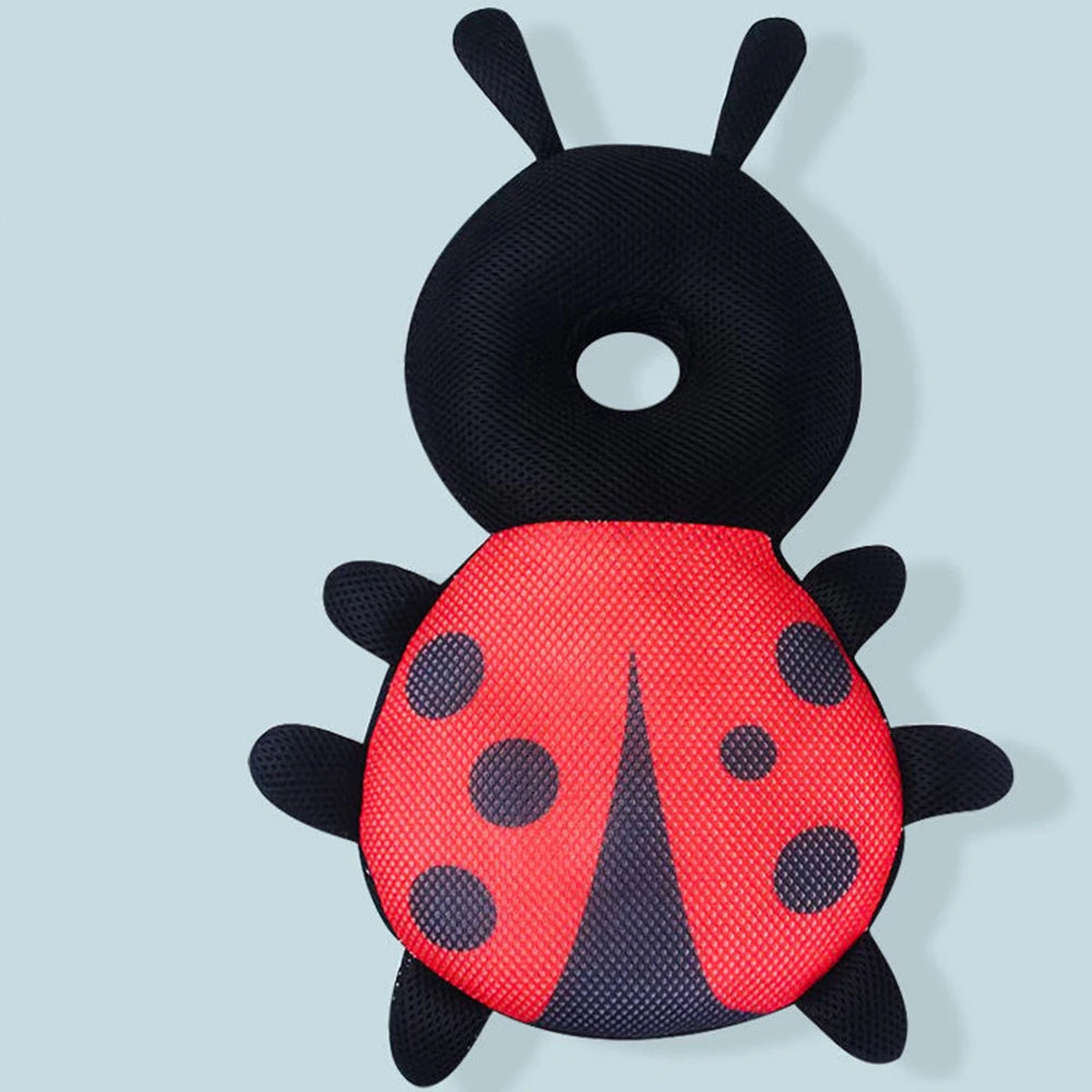 A black and red toddler head protector backpack shaped like a ladybug.