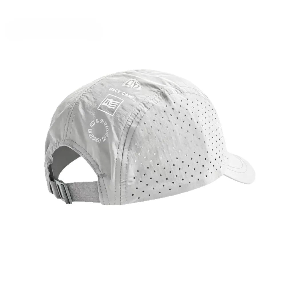 A white mesh baseball cap with a curved brim and a logo on the front