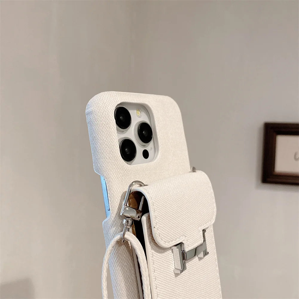 A white crossbody lanyard wallet case with a card holder is shown against a plain light background.