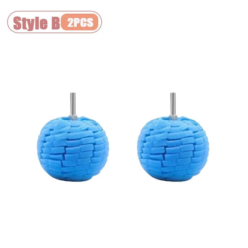 A pair of blue drill polishing sponge cones for wheels and automotive detailing.