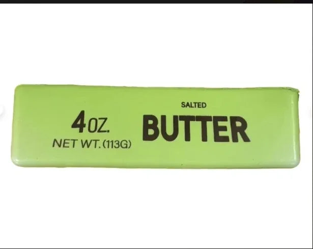 A rectangular lime green container labeled Salted Butter with a net weight of 4 oz or 113g.