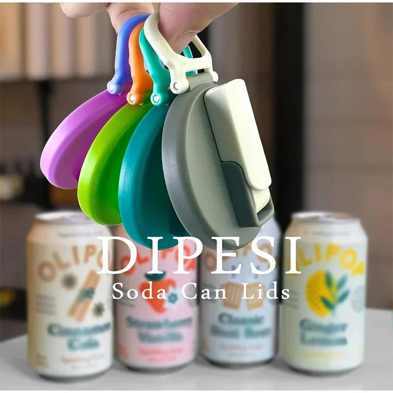 A hand is holding various colored reusable silicone can lids with straws, displayed next to soda cans.