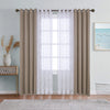 Dual layer window curtains featuring a sheer white layer and a solid taupe blackout layer hanging over a window.