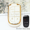 A gold and white TPU key fob cover for a car key, shown next to the original black key.