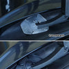 Close-up photograph of a transparent and black car windshield wiper hole protective cover.
