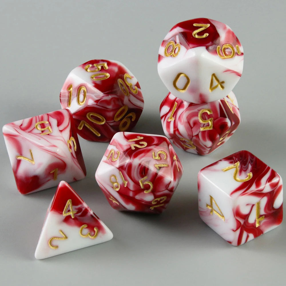 A set of seven polyhedral dice featuring a marbled red and white design, displayed on a gray surface.