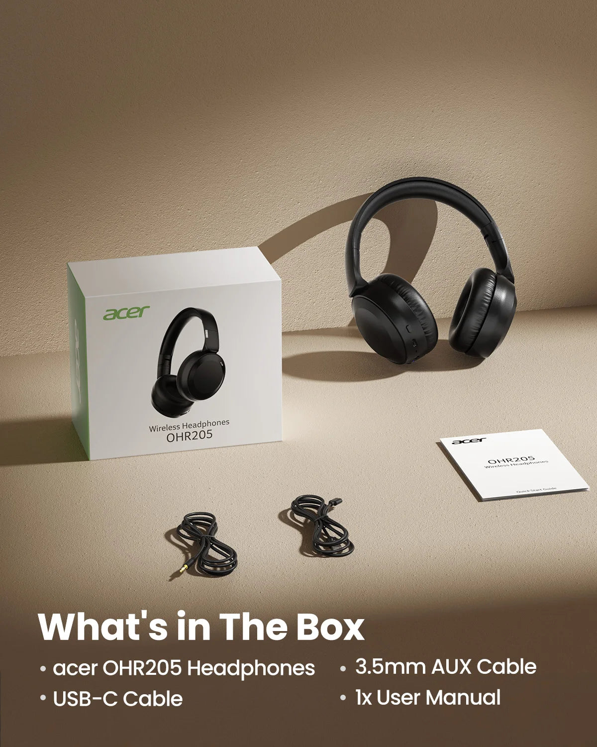 A box and black over-ear headphones are displayed on a beige surface with accessories.