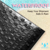 Close-up view of black waterproof bubble mailers with water droplets, emphasizing their protection against rain.