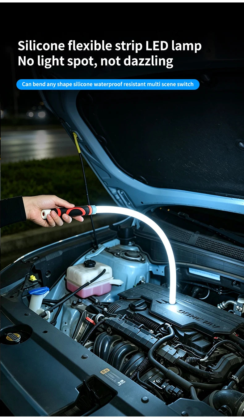 A hand is holding a flexible silicone LED strip lamp inside a car engine bay.