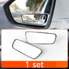 A set of two black blind spot mirrors for a car vehicle interior view.