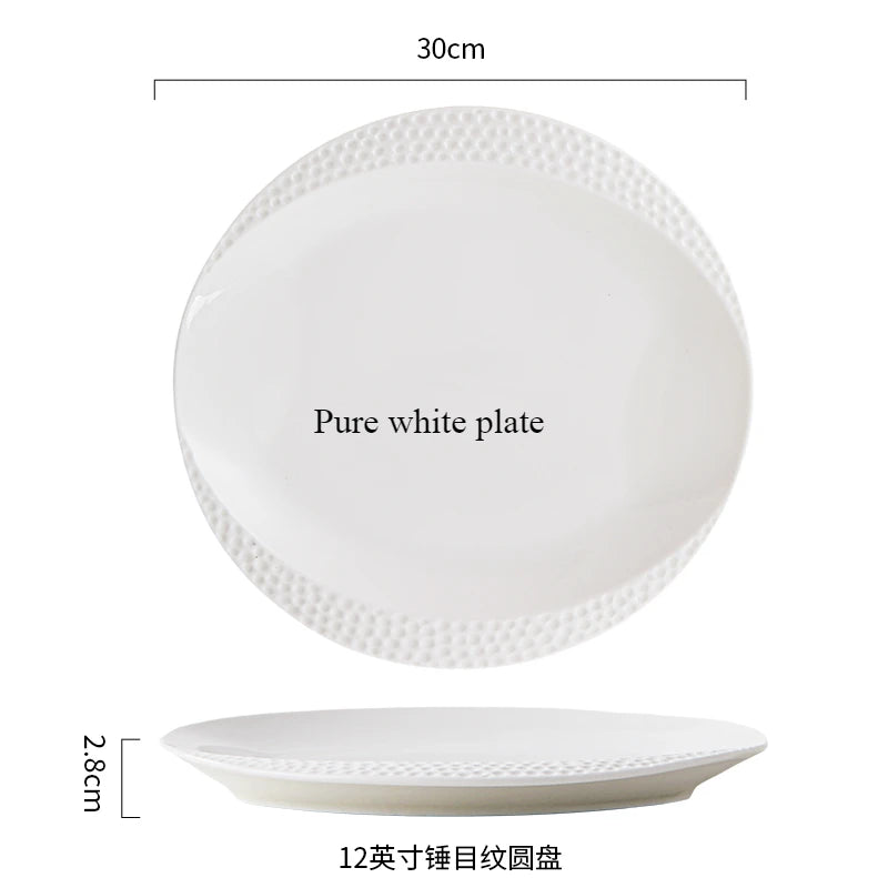 A pure white plate with a decorative rim and a shallow bowl shown from top and side views.