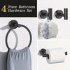 A set of four black bathroom hardware accessories including a towel ring, hooks, and toilet paper holder.