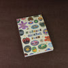 A colorful sticker book featuring fruit, animals, and various designs for scrapbooking.