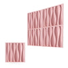 A set of pink 3D diamond textured wall panels designed for modern accent wall decor.