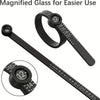 A black ring sizing tool with a magnifier and adjustable measuring ruler shown in various views.